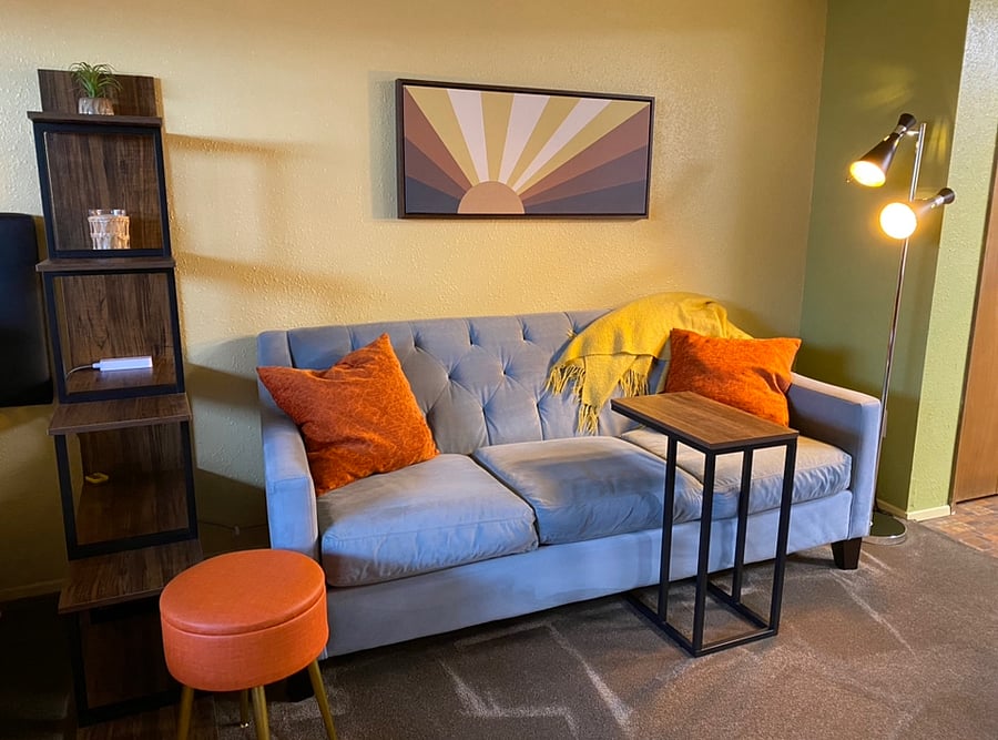 orange stool opens for storage