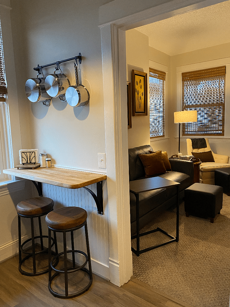 Custom built table attached to wall, great for eating or use as a desk.