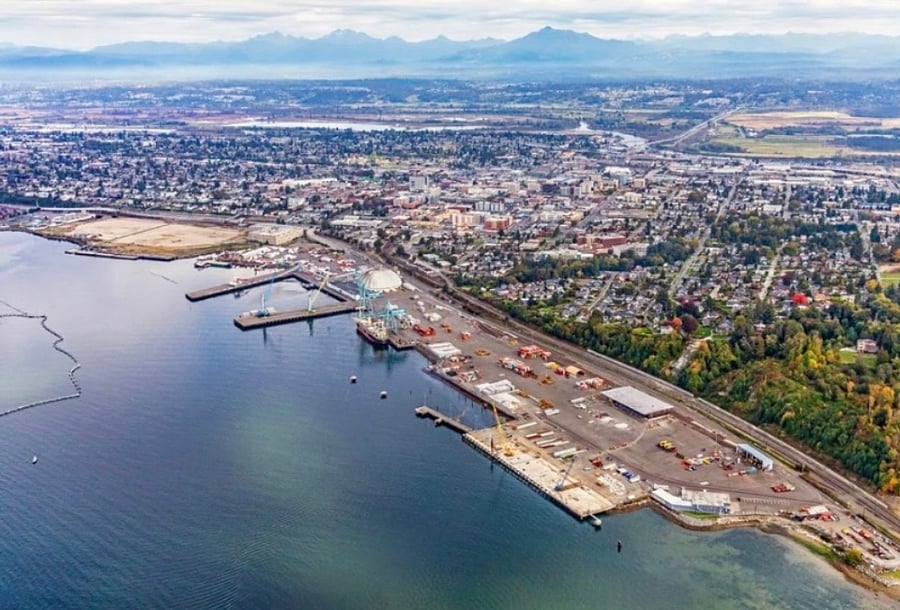 Possession Sound. View of Port of Everett, Downtown Everett. Cascade Mountain range in the distance.