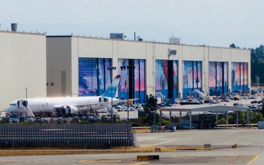 4 miles away. Birthplace of Boeing airplanes. Paine Field has become a major tourist destination with the opening of the Future of Flight Aviation Center, Boeing Tour and the Museum of Flight Restoration Center. The airport is anxiously awaiting the upcoming reopening of the Wartime History Museum (formerly the Flying Heritage & Combat Armor Museum). The assembly building is the largest building in the world based on volume and is where Boeings largest aircraft are assembled.The Boeing Tour lasts 90 minutes, and it starts and ends at the Boeing Future of Flight Aviation Center. The center has a number of interesting exhibits and can be visited before or after you take the factory tour.