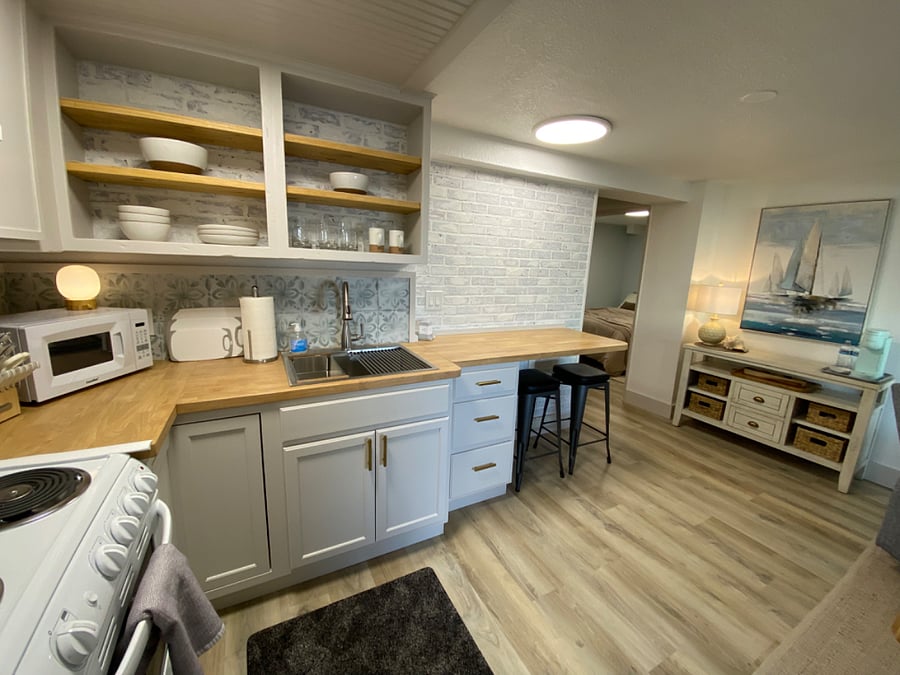 Kitchen area.. built in counter with charging station. Perfect for working on lap top.