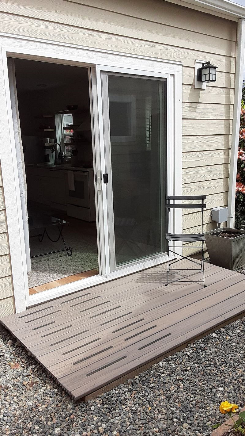 Deck off of slider, area is fenced for privacy. (approx 10x15)