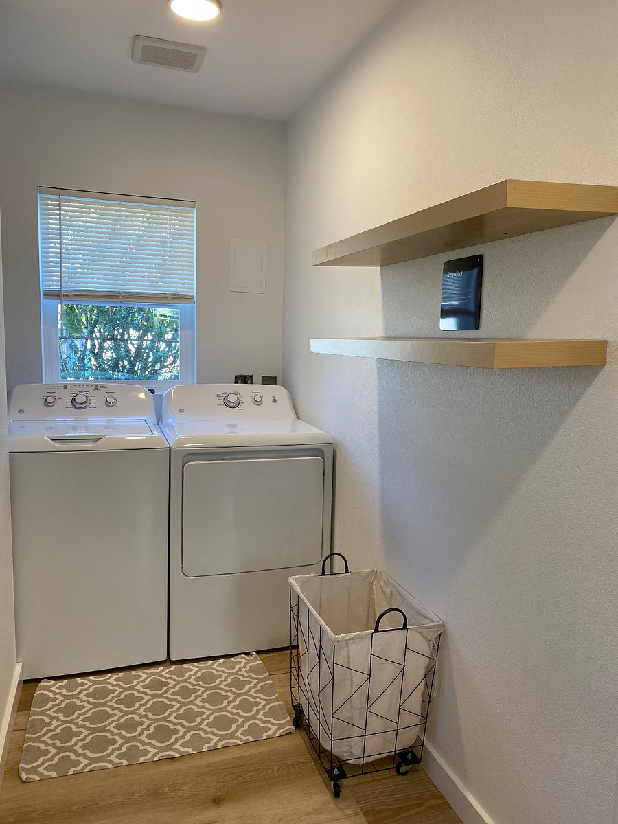 Full size washer and dryer and floating shelves!