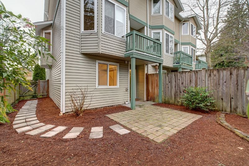 Fenced in backyard. There is a balcony off the 2nd floor living room area.