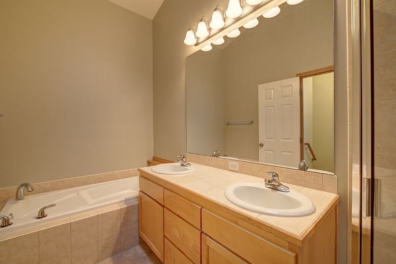 3rd floor master bathroom, full bathroom with jacuzzi bath and separate shower stall, skylight.