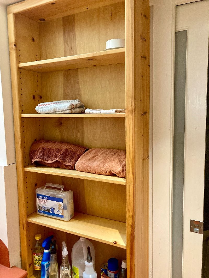 Shelves in 4'x4' space between bathroom and bedroom