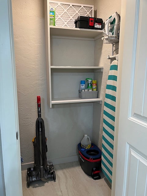 Storage closet with full size ironing board