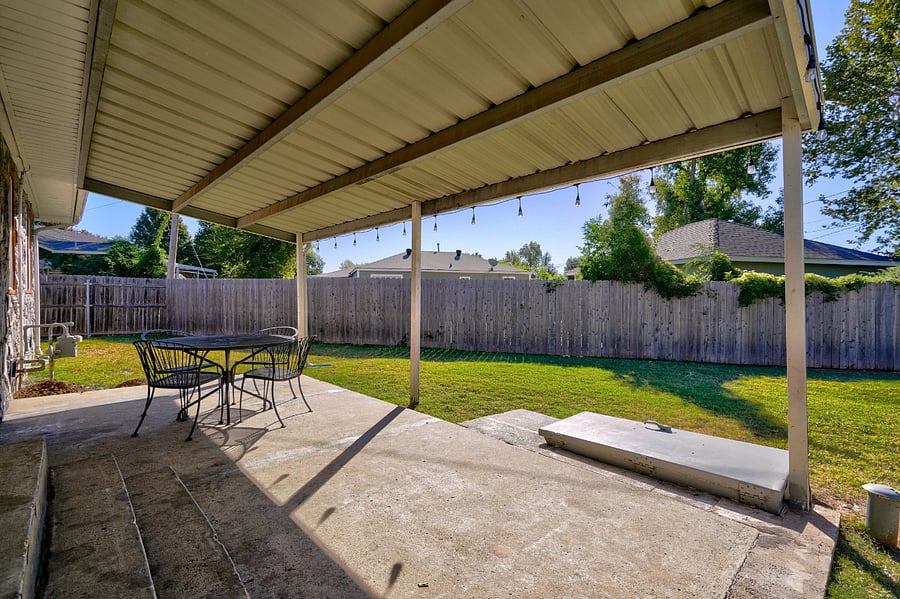 Covered patio with privacy fence