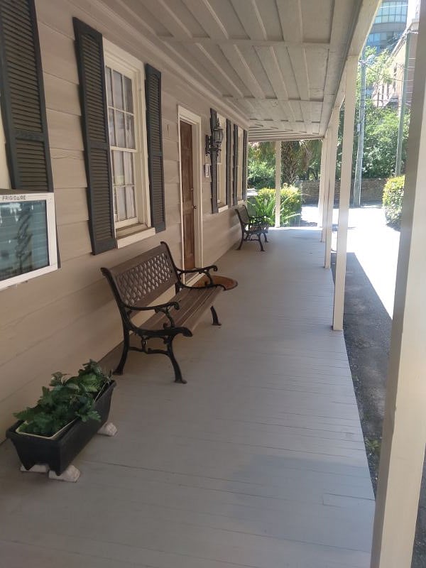 Beautiful relaxing Porch with benches and bistro set where you can relax with coffee.