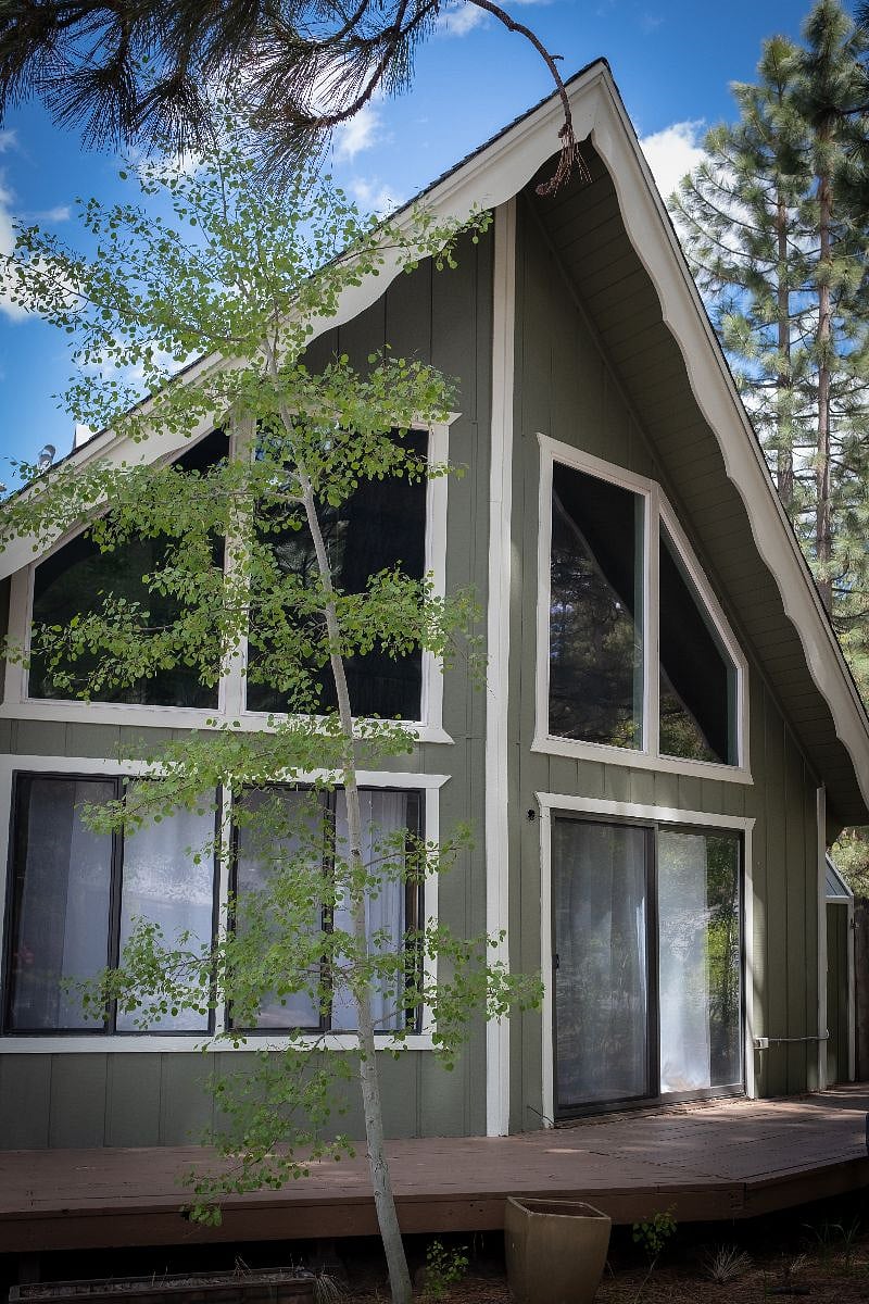 Large windows fill the great room with natural light.