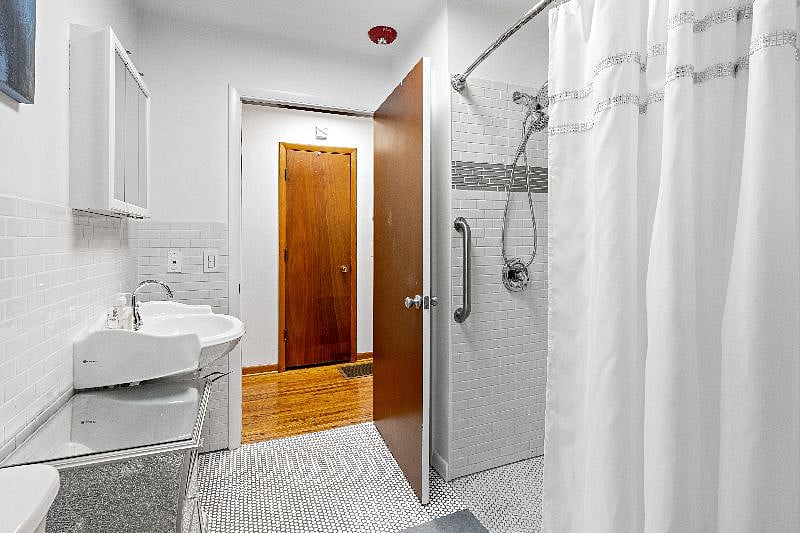 Newly remodeled bathroom view to hallway -handicap friendly