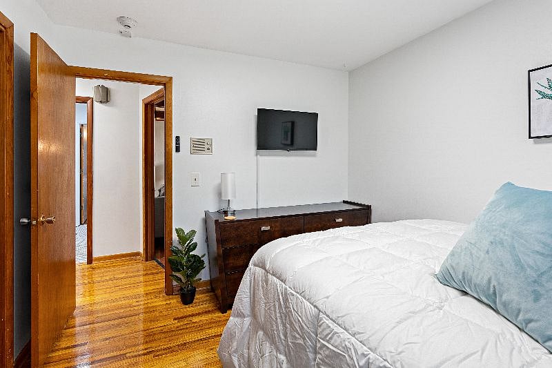 Bedroom 2 with closet and dressers 