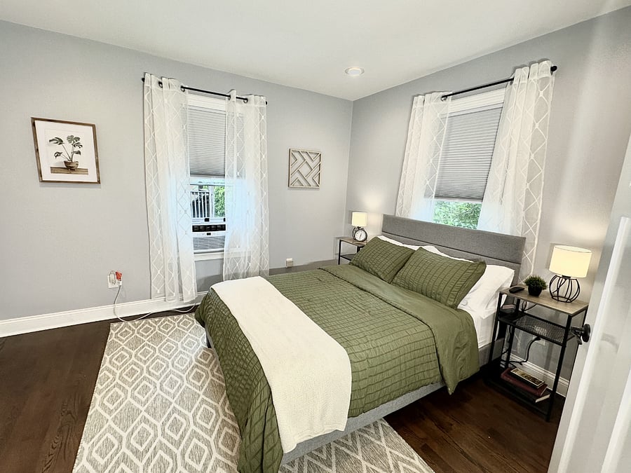 Bedroom 1 with full size bed and ensuite bathroom