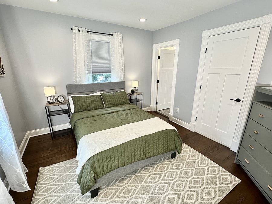 Bedroom 1 with full size bed and ensuite bathroom