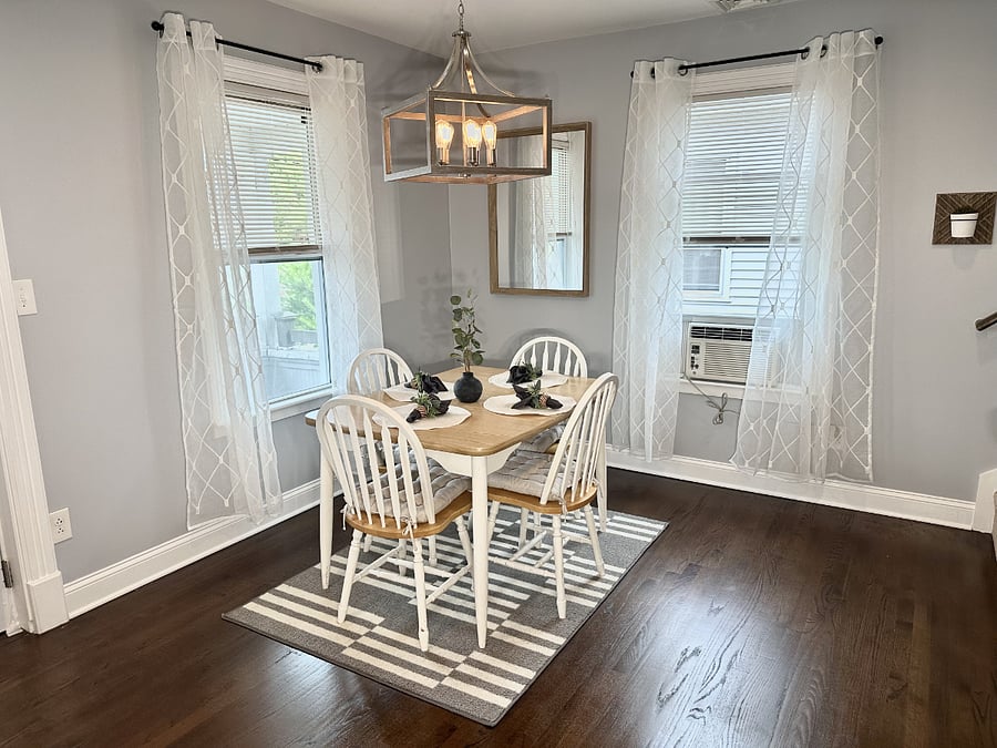 Dining area with 4 chairs.