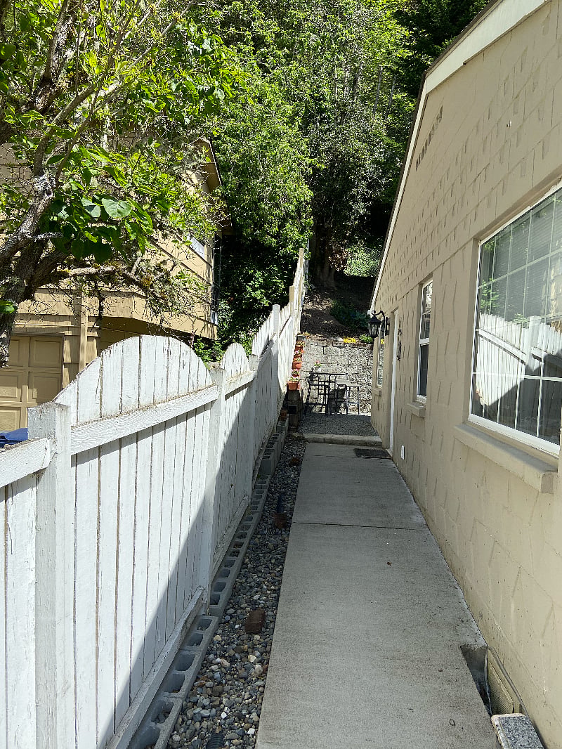 paved sidewalk to private side entrance