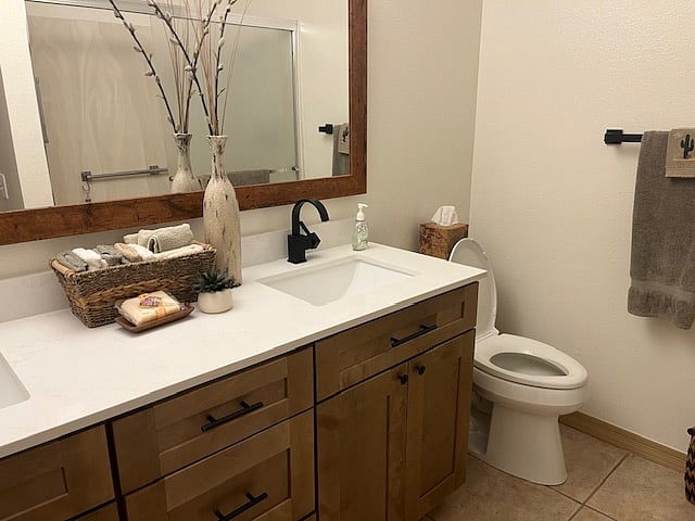 Master bedroom bath with double vanity and walk in shower