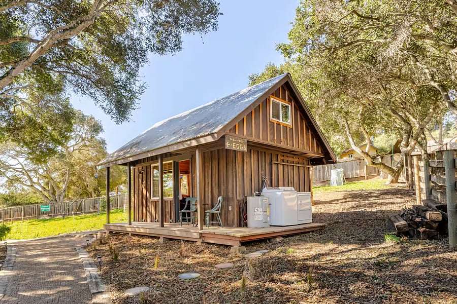 The shared washer and dryer are located on the side deck.