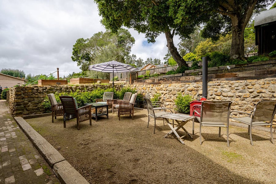 Build a fire in the wood burning stove for a quiet evening under the stars on the shared patio. Firewood is provided.