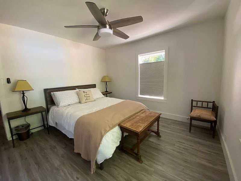 Master bedroom with remote control fan above.