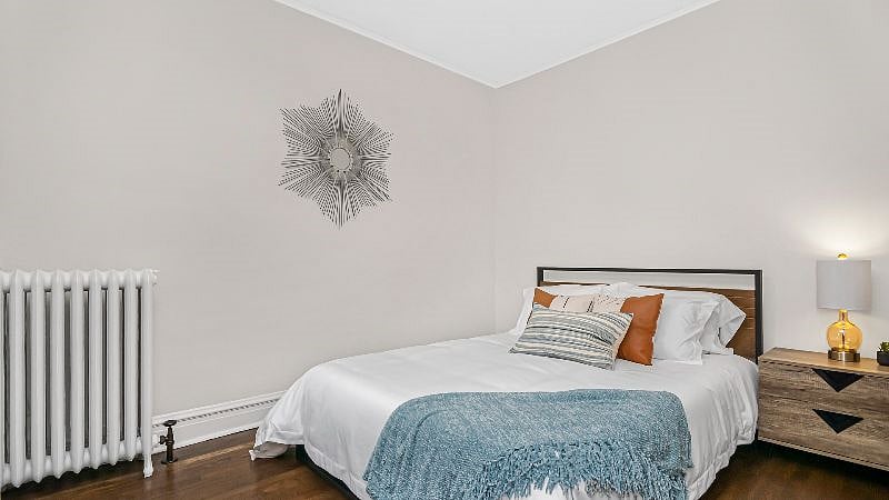 Bedroom 1 offers a comfortable memory foam queen bed with multiple pillow options, sure to meet your needs for a restful night's sleep.