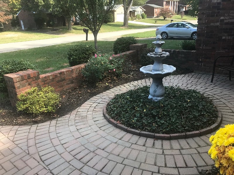Front Courtyard with bench located near the front entrance.