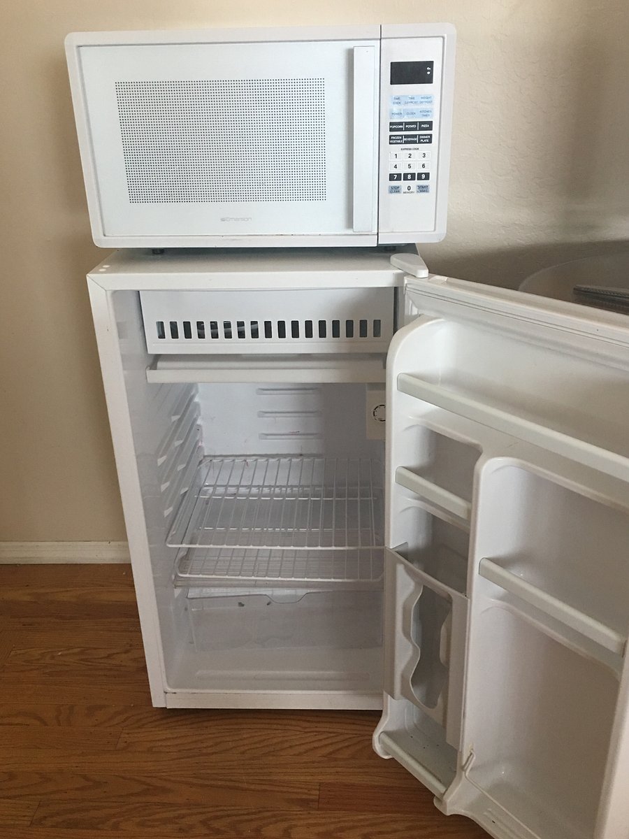 In Room refrigerator, microwave and coffee maker. In addition to full kitchen 