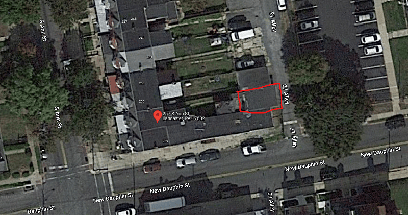 Red square is parking garage, accessed from the alley behind.
