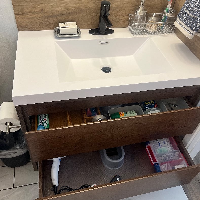 Bathroom vanity storage: Blowdryer & other necessities