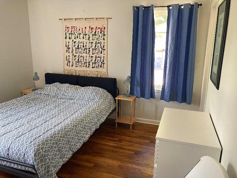 Room One: Bedroom with en-suite bathroom. Queen bed, dresser bureau, large closet. Two windows.