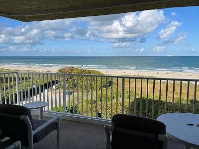 Balcony overlooking the beach and ocean
