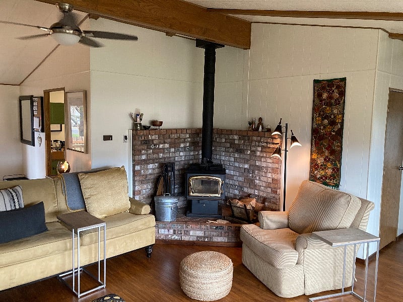 The wood stove is perfect for cool coastal days.
