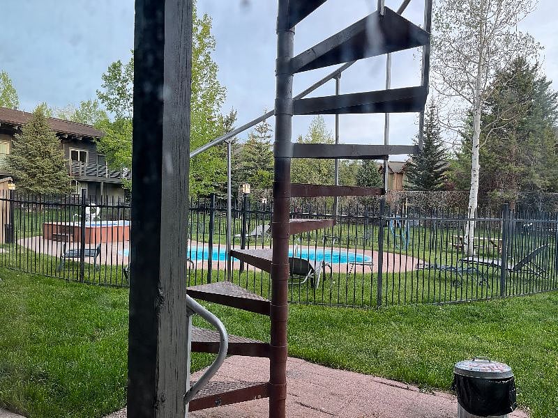 Pool, hot tub and outdoor space for pets.