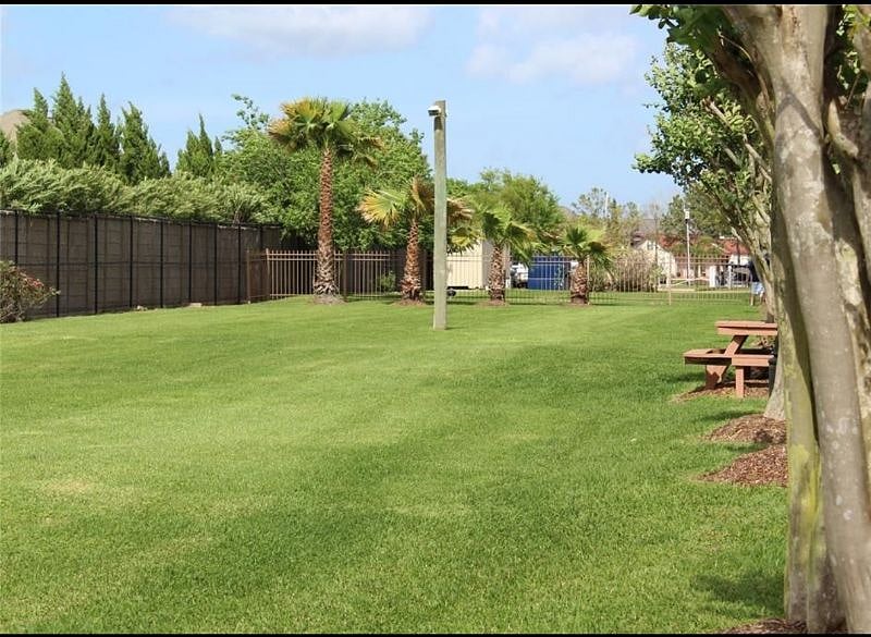 Green space to relax or walk your dog. Pet cleanup supplies provided.