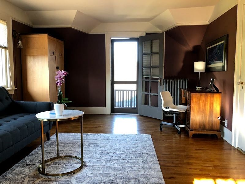 Master Bedroom looking at second floor balcony door.