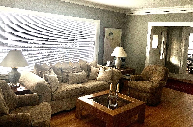 Living room looking into entry and dining.