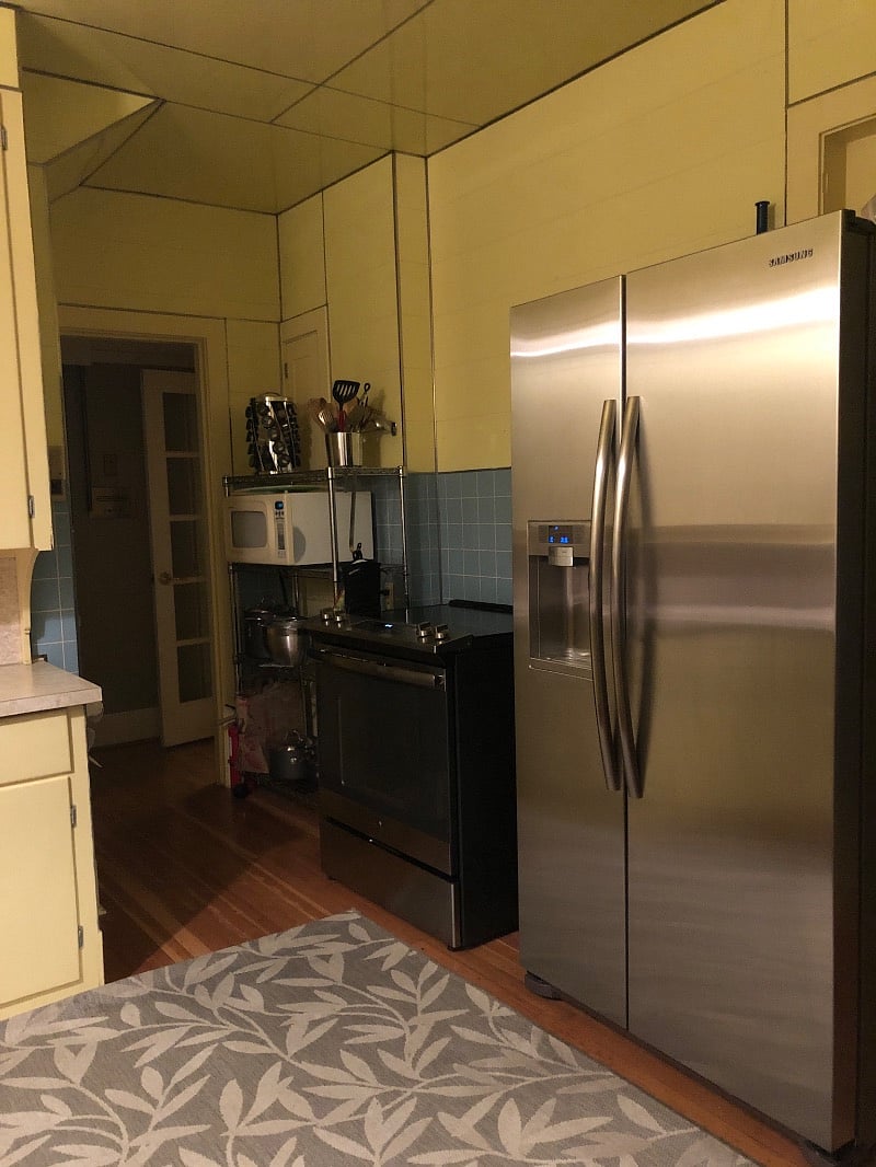 Kitchen with stainless steel refrigerator and stove. Toaster, blender, microwave, coffee pot, crock pot, pans, dishes, flatware, and all the necessities. Im
four blocks away if you are in need of anything.