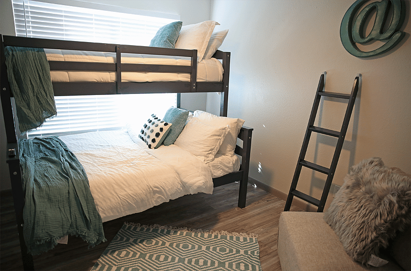 Q1: Bedroom Bunks with twin over full and mounted tv