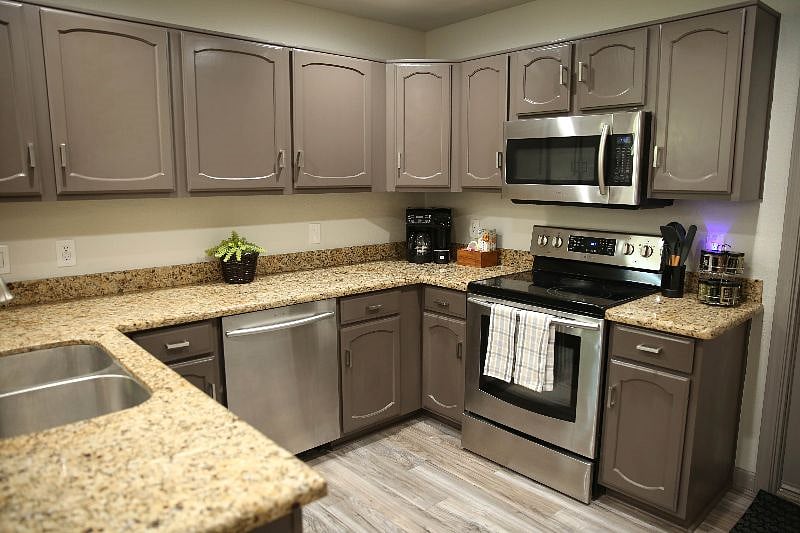 Q1: Kitchen - complete with all appliances, utensils, seasoning, coffee, water/ice in fridge door, dishwasher