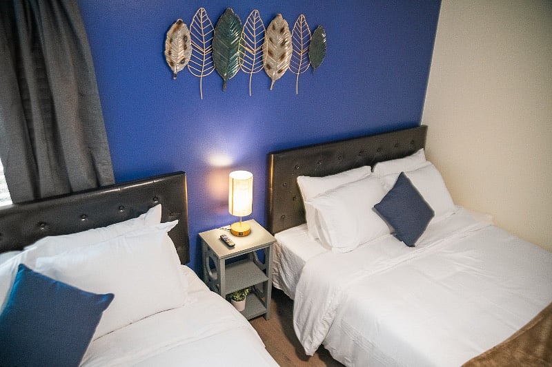 This is the bedroom in the unit. Only one queen bed is in this room now.