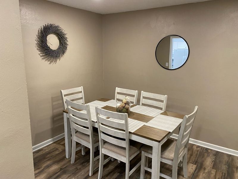 DINING AREA SEATING UPTO ALL SIX OF YOUR FAMILY MEMBERS NEXT TO THE KITCHEN FOR YOUR FAMILY DINNERS DURING YOUR STAY