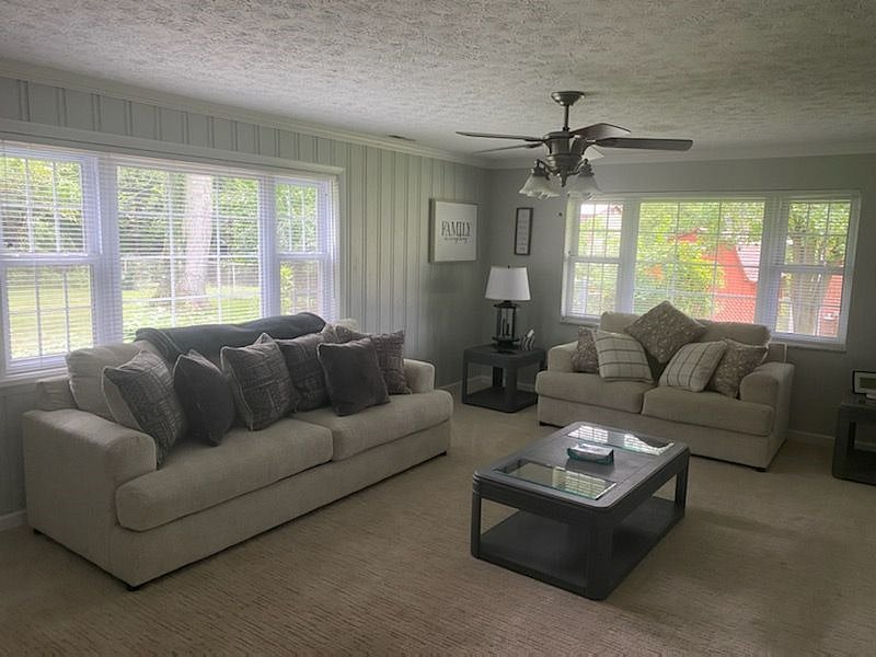 SUNNY & SEPERATE PRIVATE FAMILY ROOM FROM THE MAIN LIVING ROOM--DAY VIEW WITH NEW COUCH AND LOVE SEAT, PLENTY OF PILLOWS FOR THAT COMFORTING AFTERNOON NAP