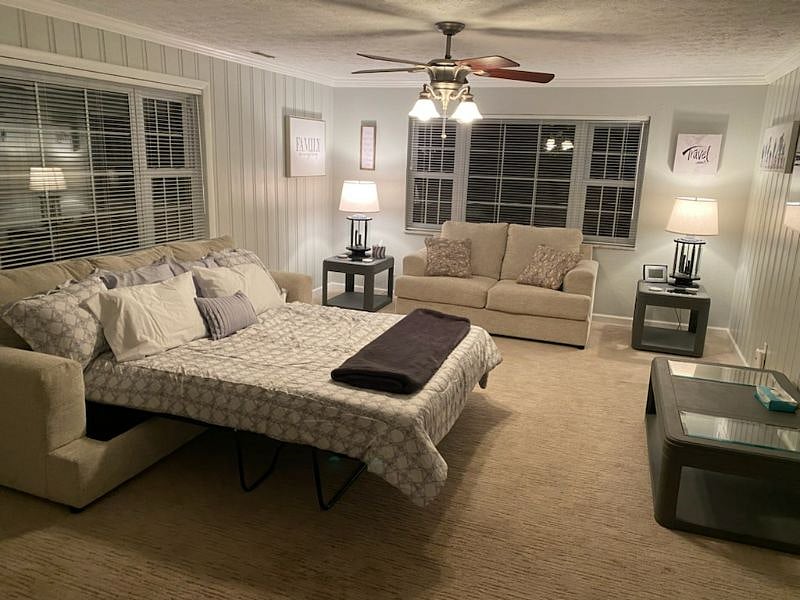 QUEEN SIZE 5TH BED SLEEPER SOFA IN FAMILY ROOM FOR A QUIET NIGHT'S REST---NIGHT VIEW