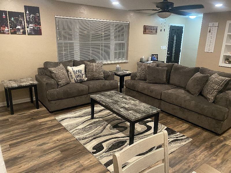 LIVING ROOM WITH BRAND NEW COUCH LOVE SEAT