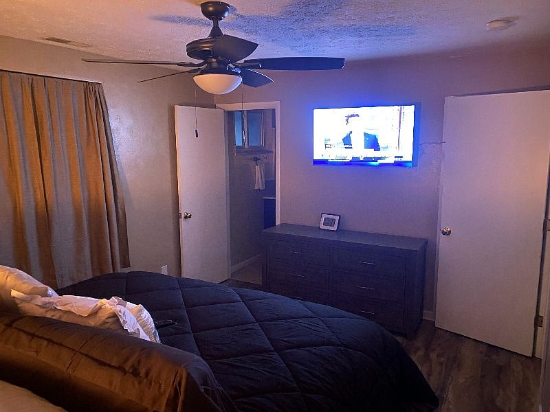 MASTER BEDROOM NIGHT TV VIEW 