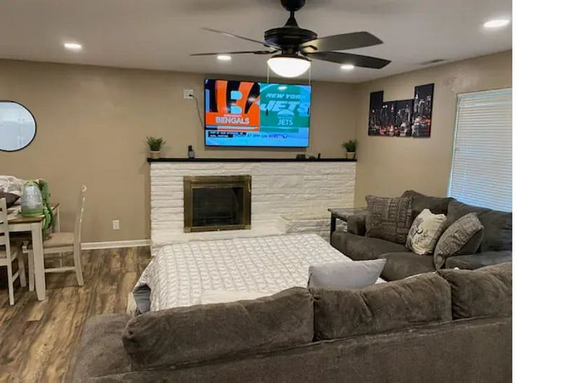 LIVING ROOM QUEEN 4TH BED SLEEPER SOFA TELEVISION VIEW WITH 70 IN TV AND INCLUDES SAMSUNG TV 1000 CHANNELS, HBO MAX, & AMAZON PRIME