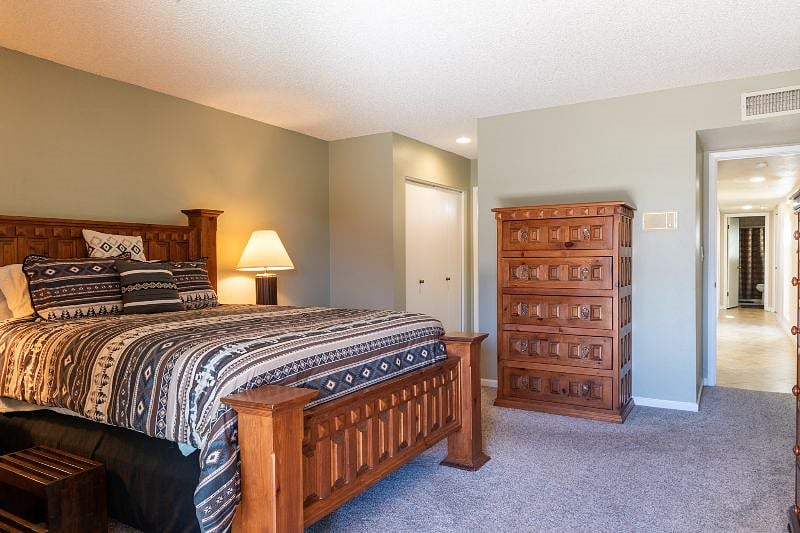 Western four-poster queen bed
