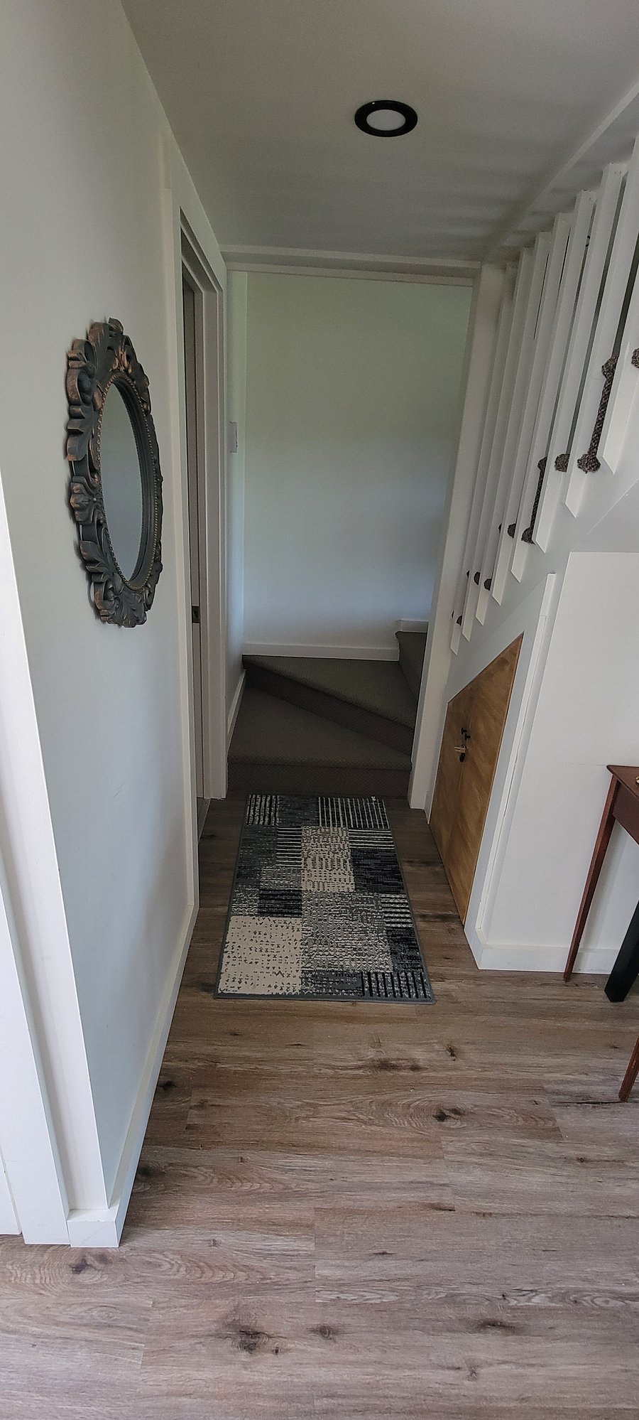 Hallway to Bathroom and Stairs to Loft
