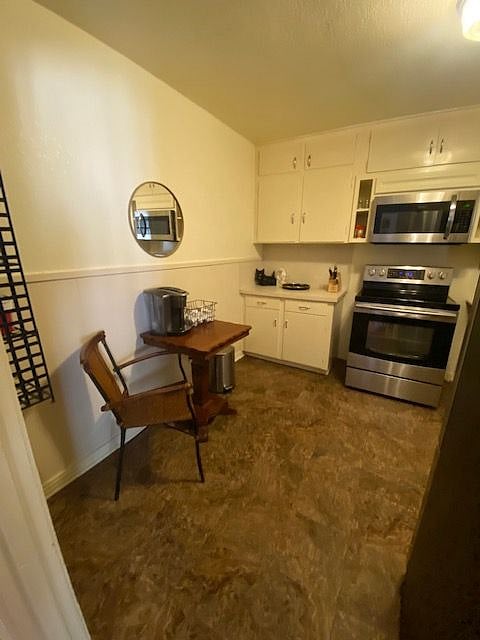 New microwave and dishwasher are installed to match the side by side fridge and the stove/oven!
