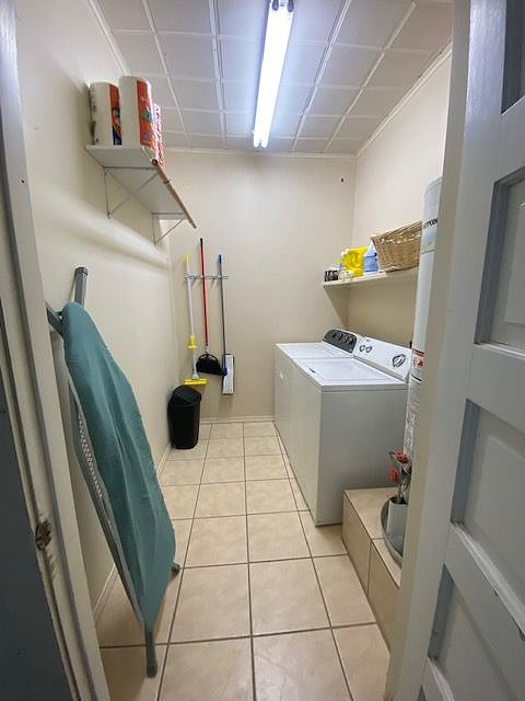 Fully furnished shared laundry room that is inside - just a few steps out of the rear of the unit and across the enclosed patio :)